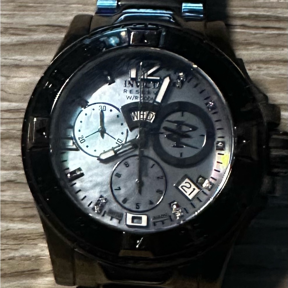 Invicta Reserve Woman’s watch. Mother of pearl face with quartz movement.